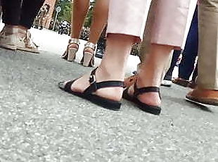 Pretty young girl in sandals