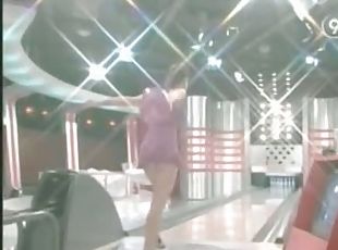 Sexy up skirt video of a tv girl bowling in mini dress