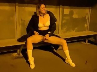 At the bus stop shows her hairy pussy and pisses!